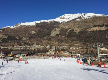 Image of village at bootom of ski slopes